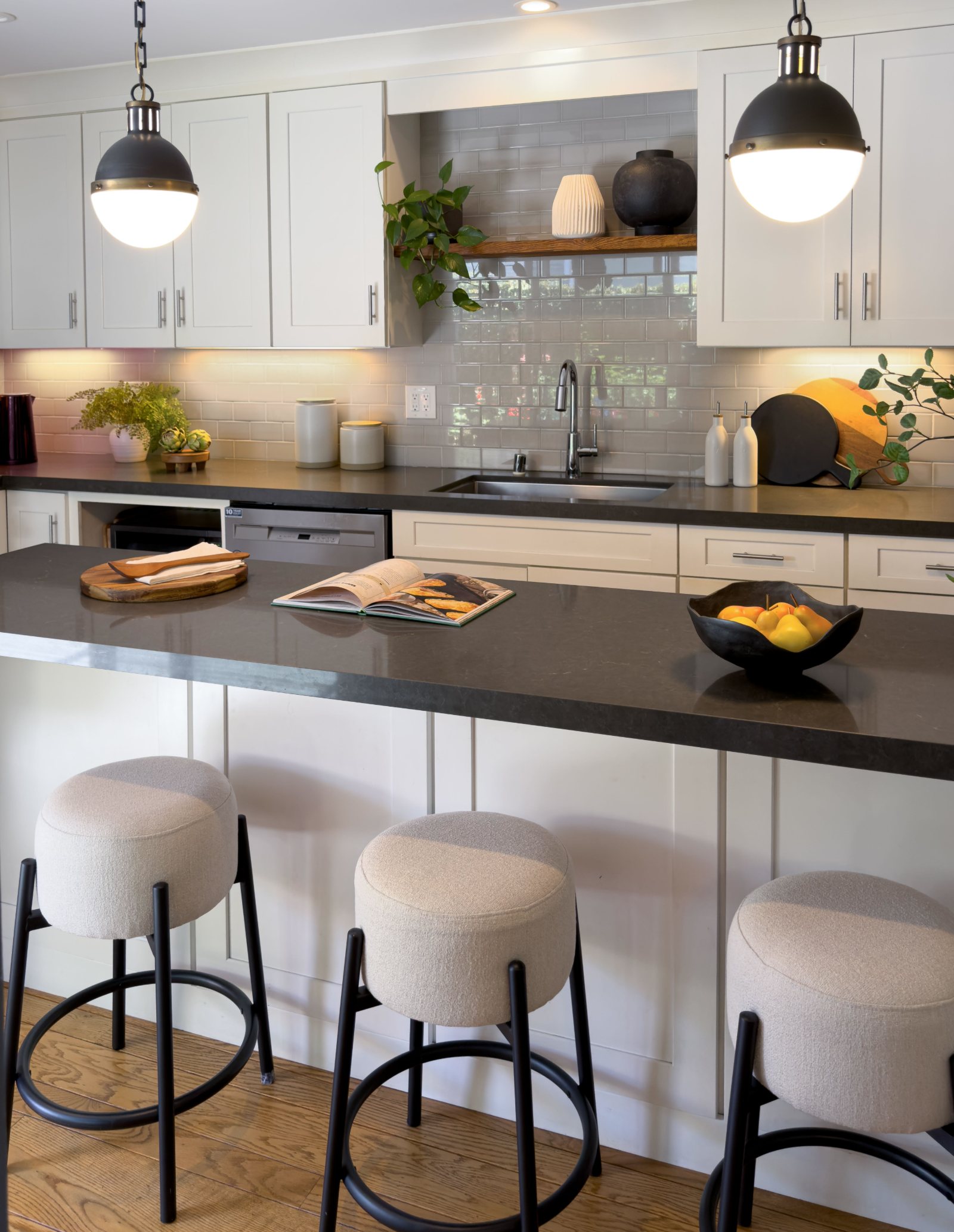 Staged kitchen with pendant lights and counter stools, San Carlos